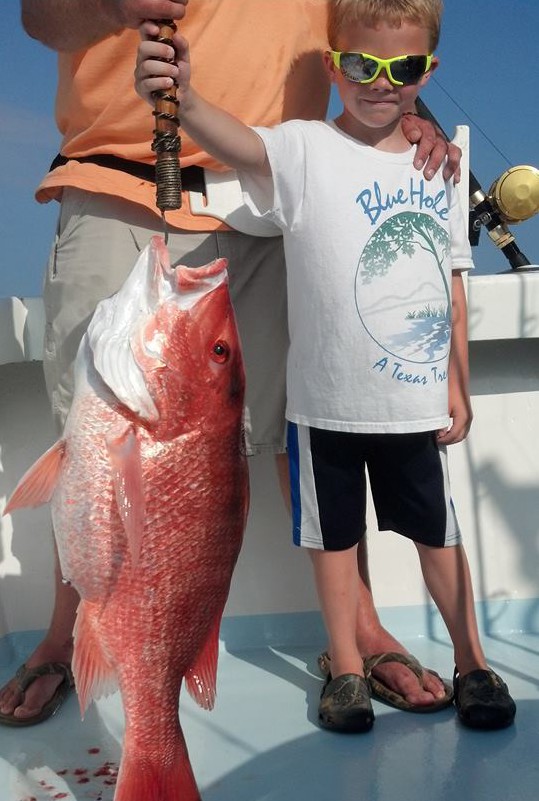 Child with red snapper