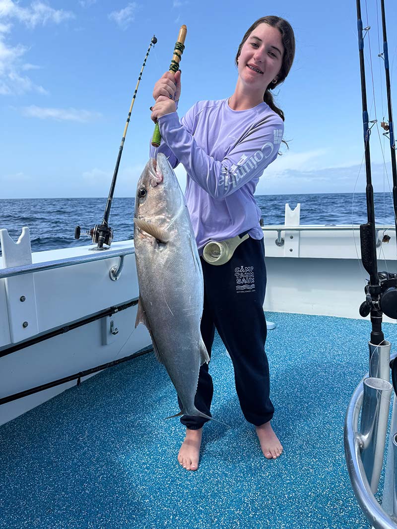 You girl with catch aboard the Finest Kind Charter Boat