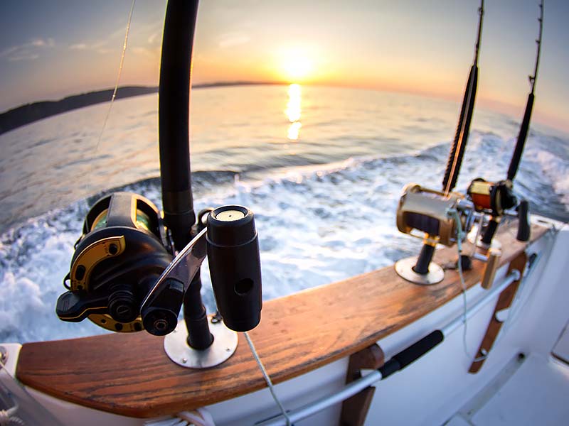 Rods and Reels on a charter boat, heading out to sea.